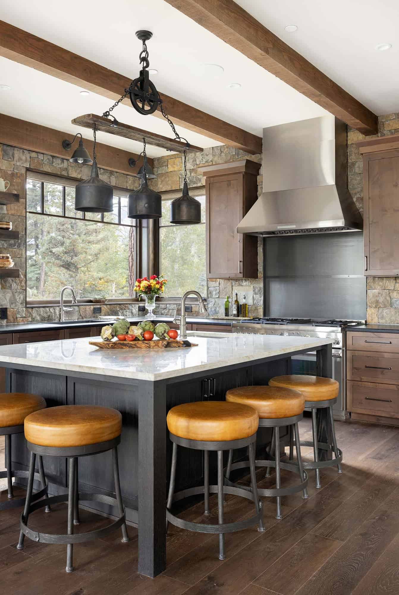 traditional style kitchen with a large island and counter stools