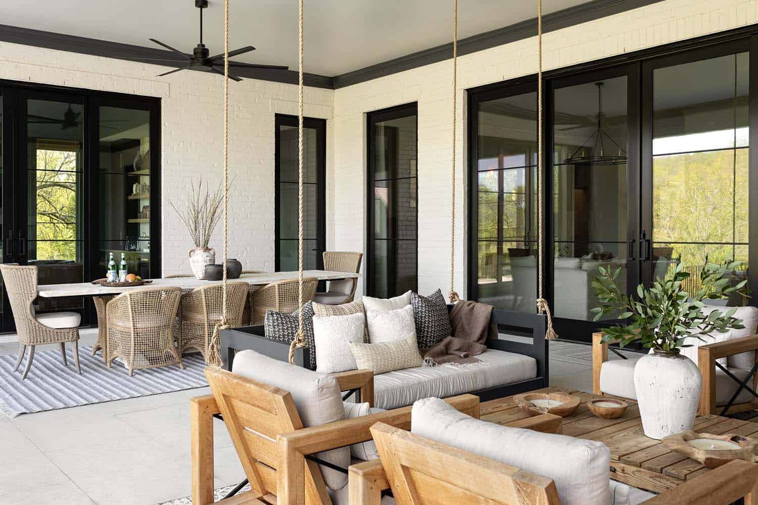 transitional style covered porch with outdoor furniture
