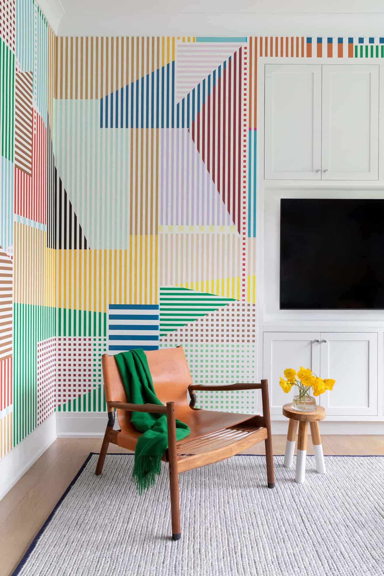 transitional style kids playroom with graphic wallpaper