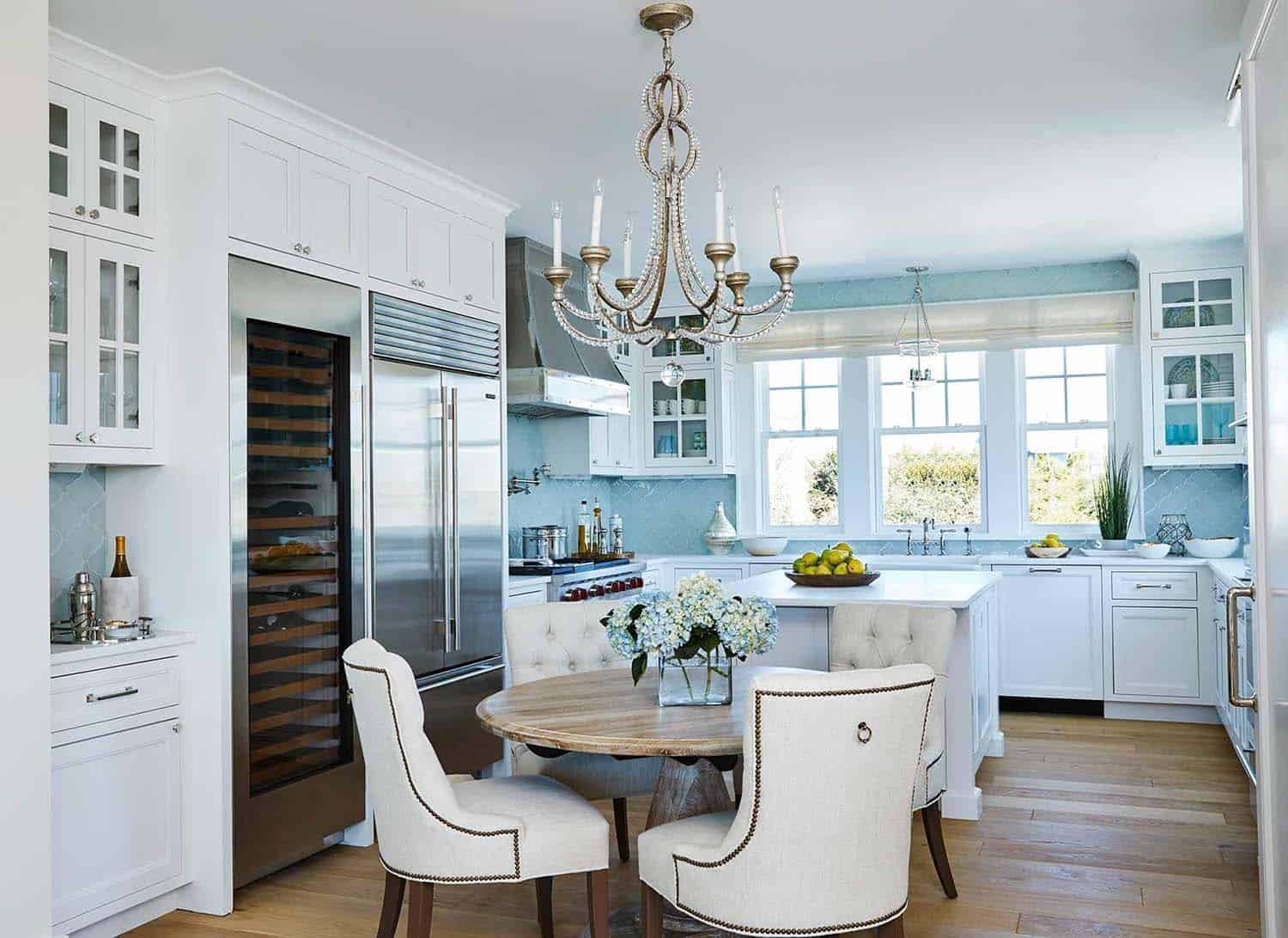 beach style kitchen with a dining table