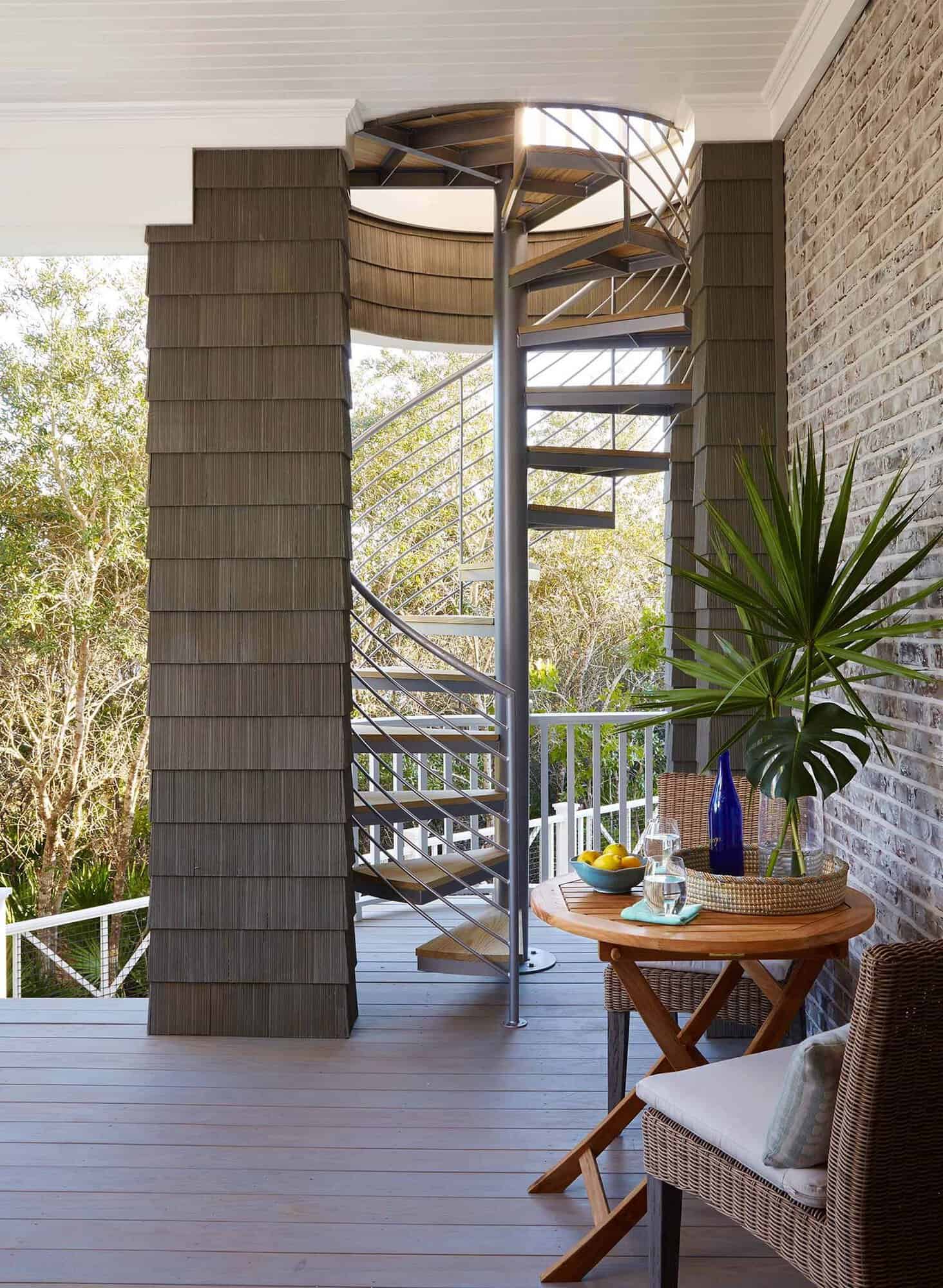 beach style deck with a spiral staircase