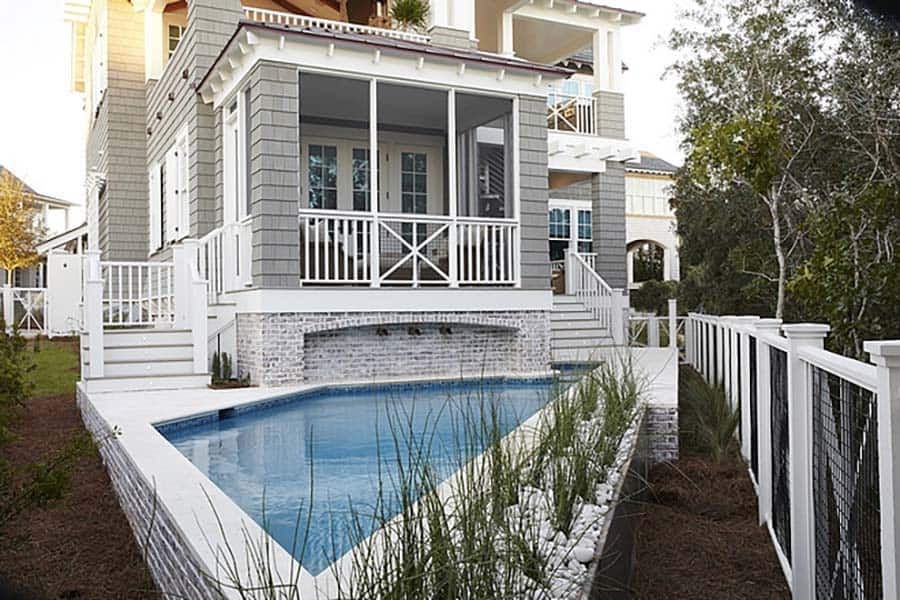 beach house exterior with a pool