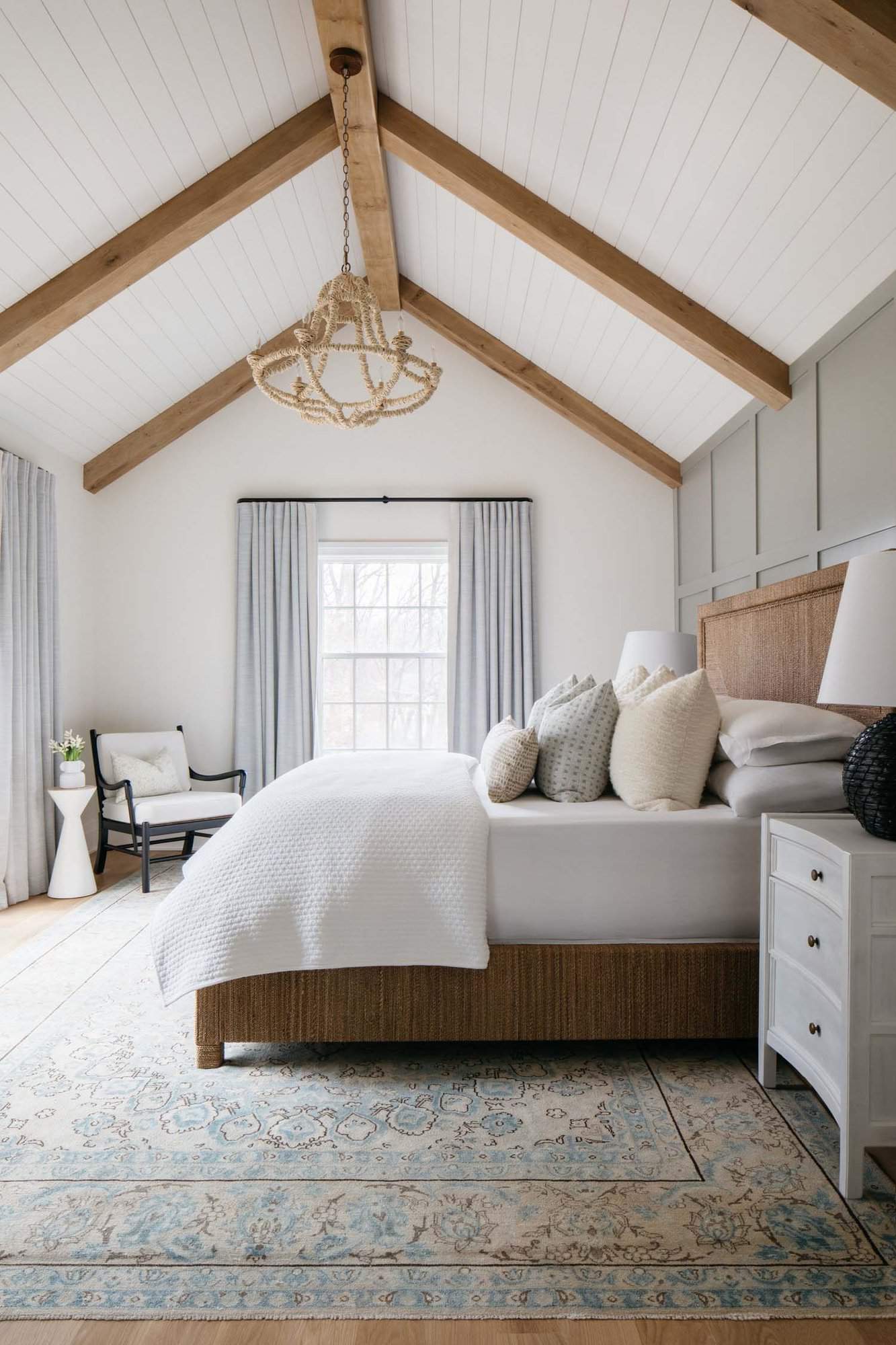 contemporary bedroom with a vaulted ceiling